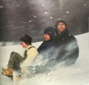 julian-yoko-and-john-sledding-in-central-park-xmas-1977-v0-j0trvm1y9c7c1.jpg
